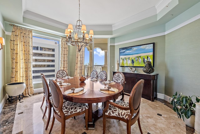 5310 N Ocean Dr Unit Ph-1201, Singer Island, FL 33404 - dining area with a raised ceiling, baseboards, and ornamental molding