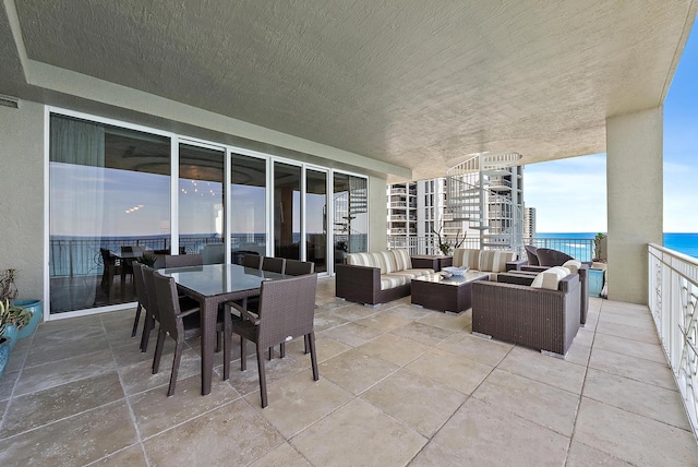 5310 N Ocean Dr Unit Ph-1201, Singer Island, FL 33404 - view of patio / terrace with an outdoor hangout area and outdoor dining space