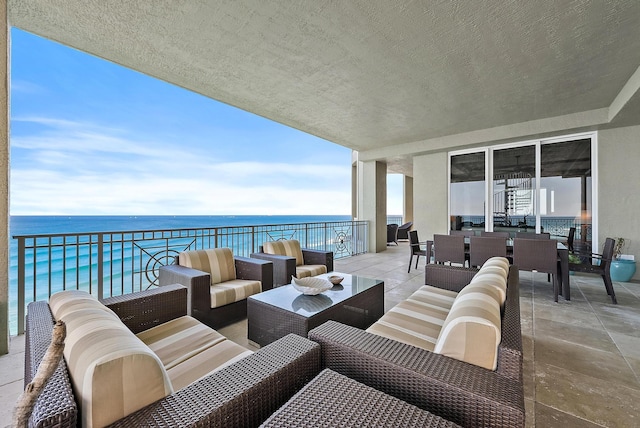 5310 N Ocean Dr Unit Ph-1201, Singer Island, FL 33404 - balcony with an outdoor living space, a water view, and outdoor dining space