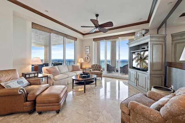 5310 N Ocean Dr Unit Ph-1201, Singer Island, FL 33404 - living area with a tray ceiling, ceiling fan, and crown molding