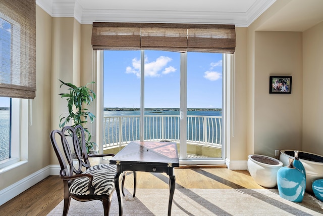 5310 N Ocean Dr Unit Ph-1201, Singer Island, FL 33404 - office space featuring baseboards, wood finished floors, ornamental molding, and a water view