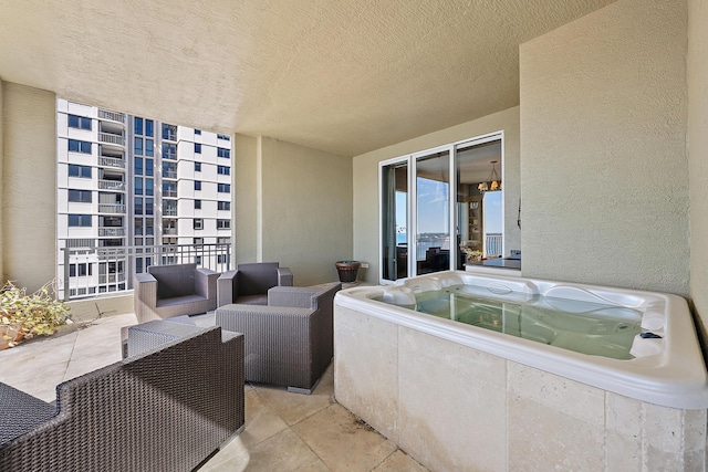 5310 N Ocean Dr Unit Ph-1201, Singer Island, FL 33404 - view of patio / terrace featuring a jacuzzi and a balcony
