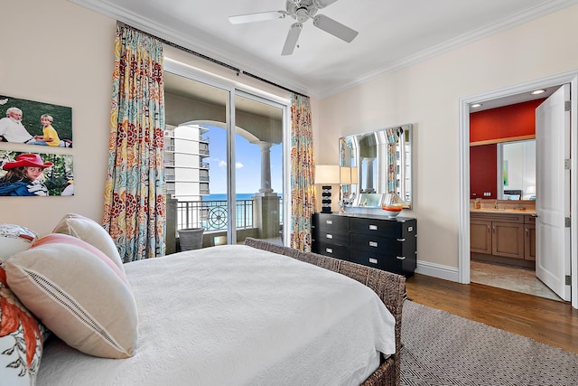 5310 N Ocean Dr Unit Ph-1201, Singer Island, FL 33404 - bedroom featuring ornamental molding, ensuite bathroom, wood finished floors, baseboards, and access to exterior