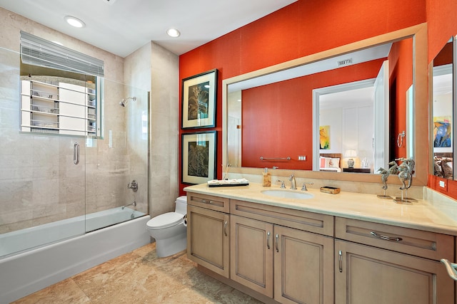 5310 N Ocean Dr Unit Ph-1201, Singer Island, FL 33404 - bathroom with vanity, visible vents, recessed lighting, toilet, and combined bath / shower with glass door