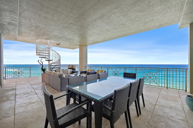 5310 N Ocean Dr Unit Ph-1201, Singer Island, FL 33404 - view of patio featuring outdoor dining space, an outdoor living space, and a water view