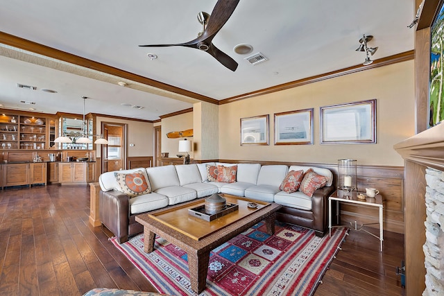 5310 N Ocean Dr Unit Ph-1201, Singer Island, FL 33404 - living room with wainscoting, crown molding, and dark wood-style flooring