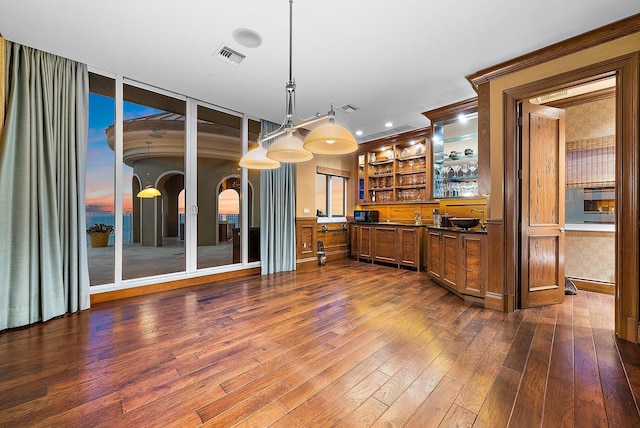 5310 N Ocean Dr Unit Ph-1201, Singer Island, FL 33404 - bar featuring a wall of windows, visible vents, dark wood-style flooring, and pendant lighting