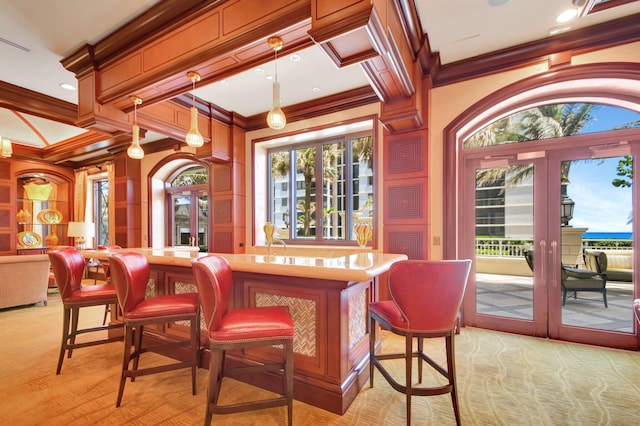 5310 N Ocean Dr Unit Ph-1201, Singer Island, FL 33404 - bar featuring indoor wet bar, crown molding, french doors, and pendant lighting
