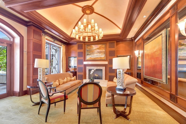 5310 N Ocean Dr Unit Ph-1201, Singer Island, FL 33404 - sitting room featuring a notable chandelier, a warm lit fireplace, lofted ceiling, and ornamental molding