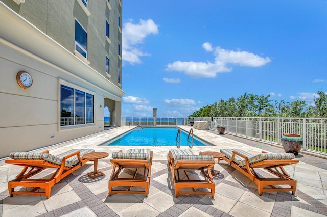 5310 N Ocean Dr Unit Ph-1201, Singer Island, FL 33404 - view of swimming pool featuring a fenced in pool, fence, and a patio area