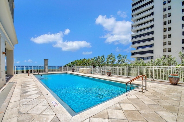 5310 N Ocean Dr Unit Ph-1201, Singer Island, FL 33404 - pool with a patio and fence
