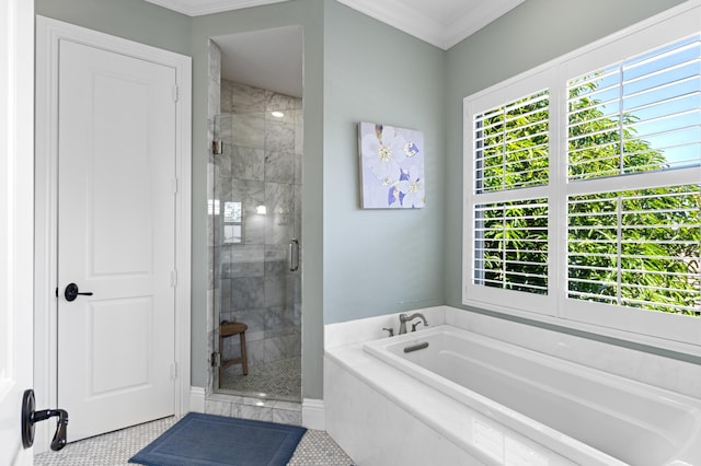 bathroom with tile patterned floors, independent shower and bath, and ornamental molding