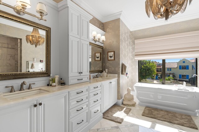 bathroom featuring a tub, an inviting chandelier, and ornamental molding