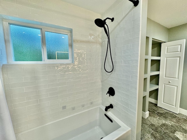 bathroom with shower / bath combo