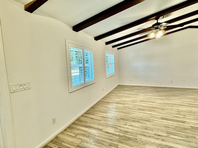 unfurnished room featuring vaulted ceiling with beams, light hardwood / wood-style floors, and ceiling fan