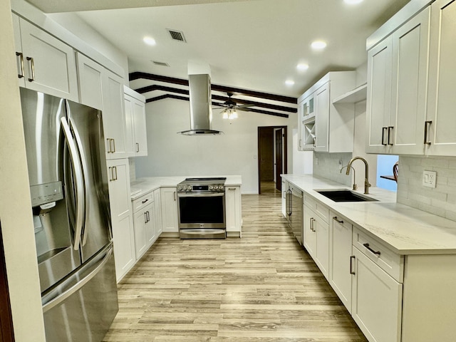 kitchen with white cabinets, lofted ceiling with beams, stainless steel appliances, and exhaust hood