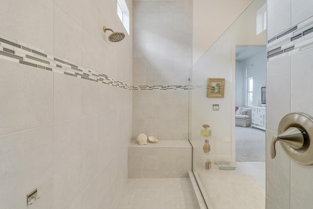 bathroom with tiled shower