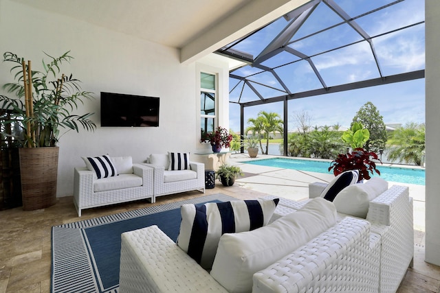 view of patio / terrace with an outdoor hangout area and glass enclosure