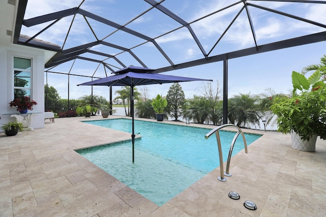 view of pool with a lanai and a patio area