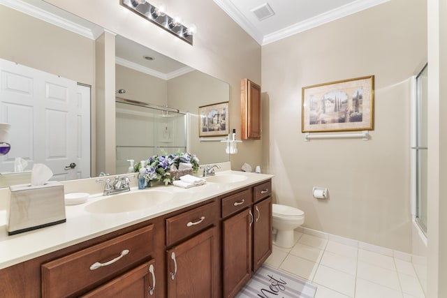 bathroom featuring crown molding, visible vents, and a sink