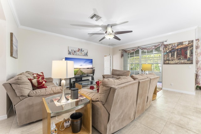 living area with light tile patterned floors, baseboards, ornamental molding, and a ceiling fan