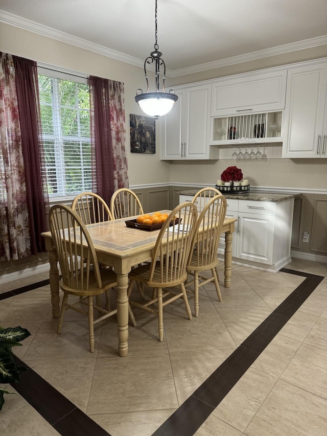 dining room with crown molding