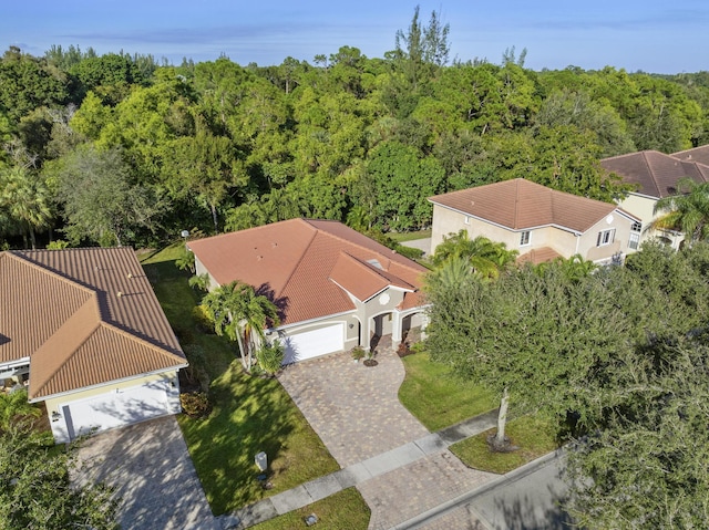 bird's eye view featuring a view of trees