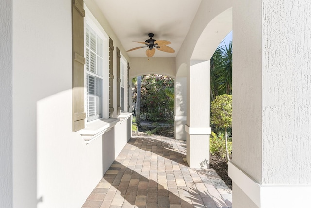 view of patio / terrace featuring ceiling fan