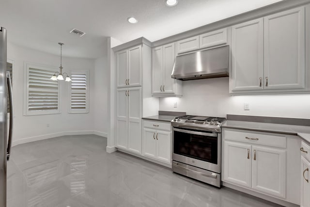 kitchen with decorative light fixtures, stainless steel stove, and an inviting chandelier