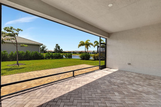 view of patio / terrace featuring a water view