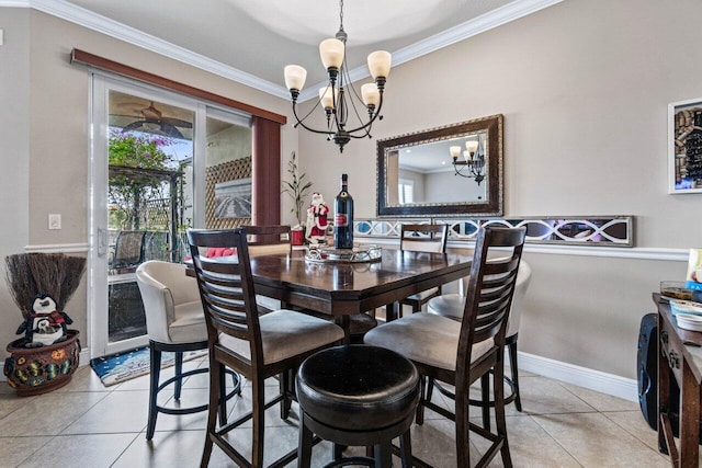 tiled dining room featuring ornamental molding and a chandelier