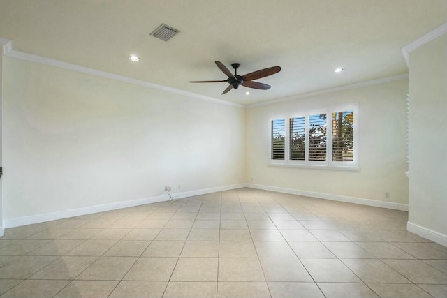 empty room featuring crown molding, ceiling fan, and light tile patterned floors