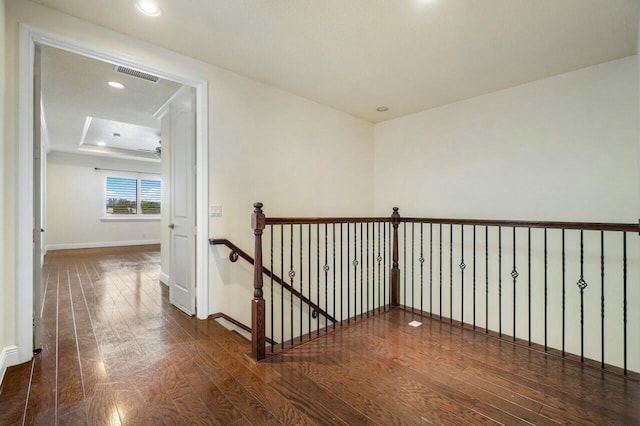 hallway featuring dark hardwood / wood-style floors