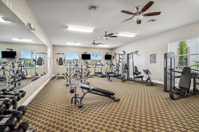 workout area with a textured ceiling