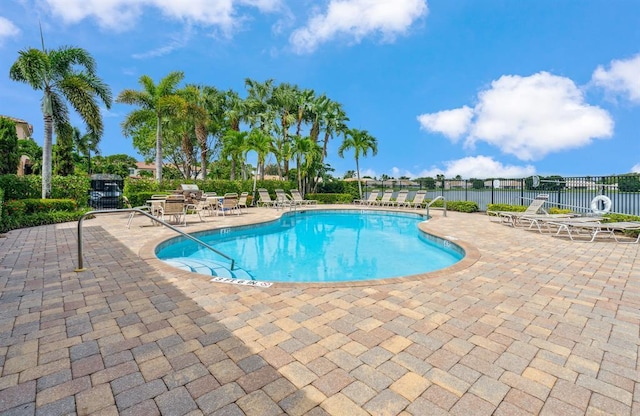 view of pool featuring a patio