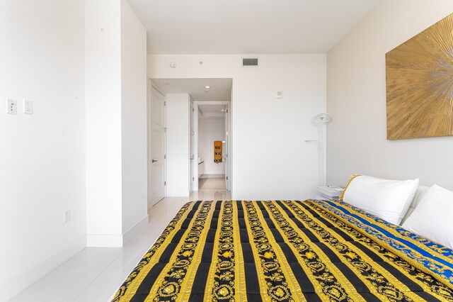 unfurnished bedroom featuring light tile patterned floors