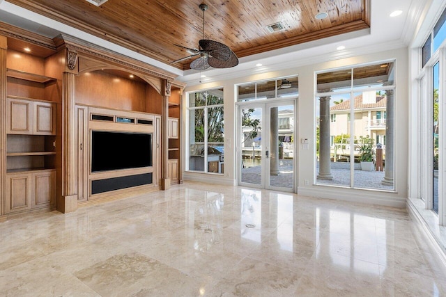 unfurnished living room with french doors, wood ceiling, a tray ceiling, ceiling fan, and built in features