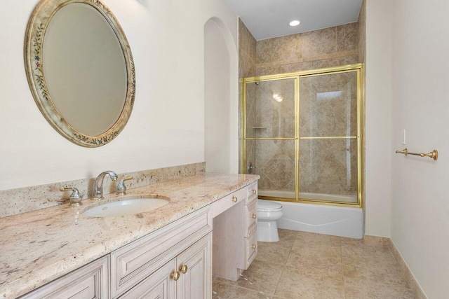 full bathroom with tile patterned floors, vanity, toilet, and shower / bath combination with glass door