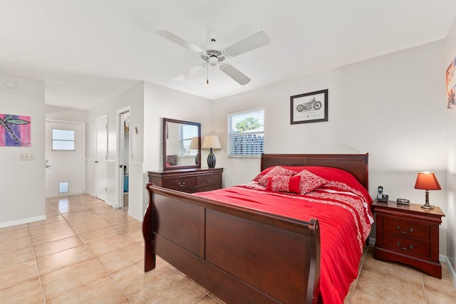 tiled bedroom featuring ceiling fan