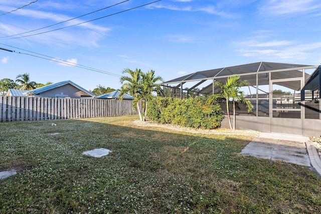 view of yard featuring a lanai