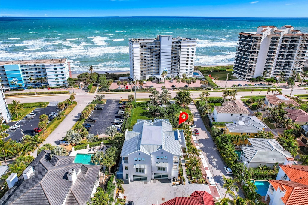 aerial view featuring a water view