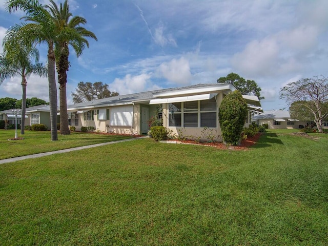 view of front of house with a front yard