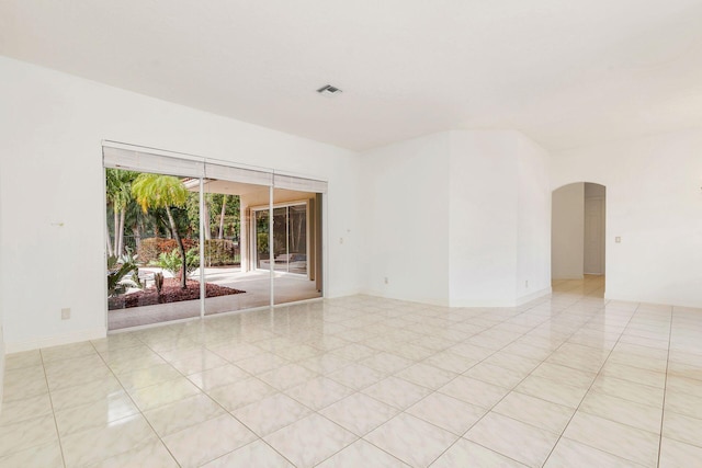 view of tiled spare room