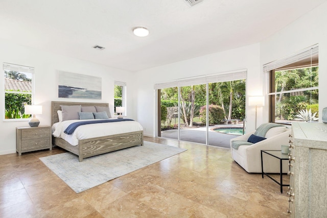 1627 Mayacoo Lakes Blvd, West Palm Beach, FL 33411 - bedroom featuring access to outside and multiple windows