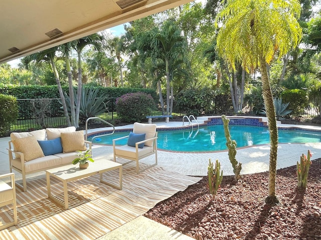 1627 Mayacoo Lakes Blvd, West Palm Beach, FL 33411 - view of pool featuring a patio, a fenced backyard, and view of wooded area