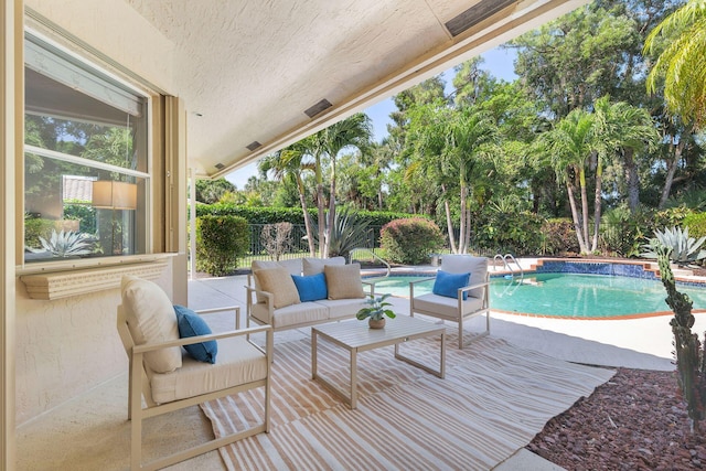 1627 Mayacoo Lakes Blvd, West Palm Beach, FL 33411 - view of pool featuring a patio, outdoor lounge area, and view of wooded area