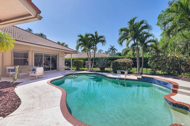1627 Mayacoo Lakes Blvd, West Palm Beach, FL 33411 - view of swimming pool with a patio