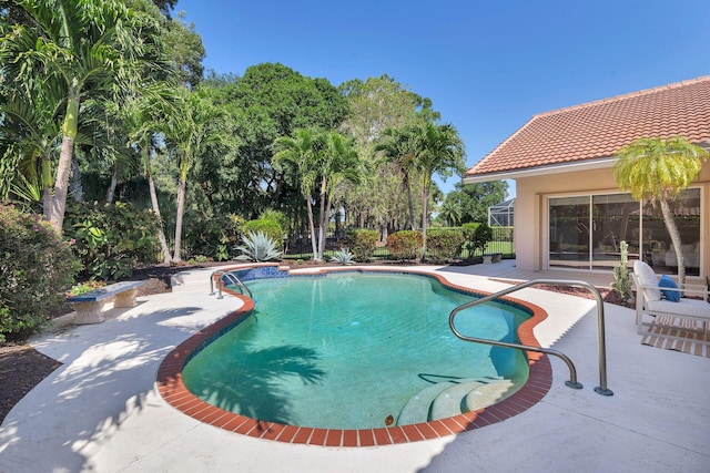 1627 Mayacoo Lakes Blvd, West Palm Beach, FL 33411 - view of swimming pool with a patio area