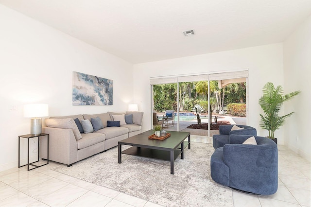 1627 Mayacoo Lakes Blvd, West Palm Beach, FL 33411 - living area featuring light tile patterned floors and baseboards
