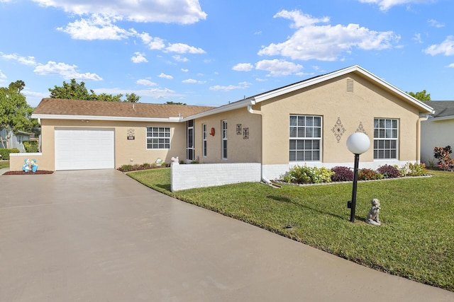 ranch-style house with a front yard and a garage